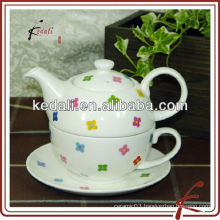 ceramic tea pot set with color-matched saucer